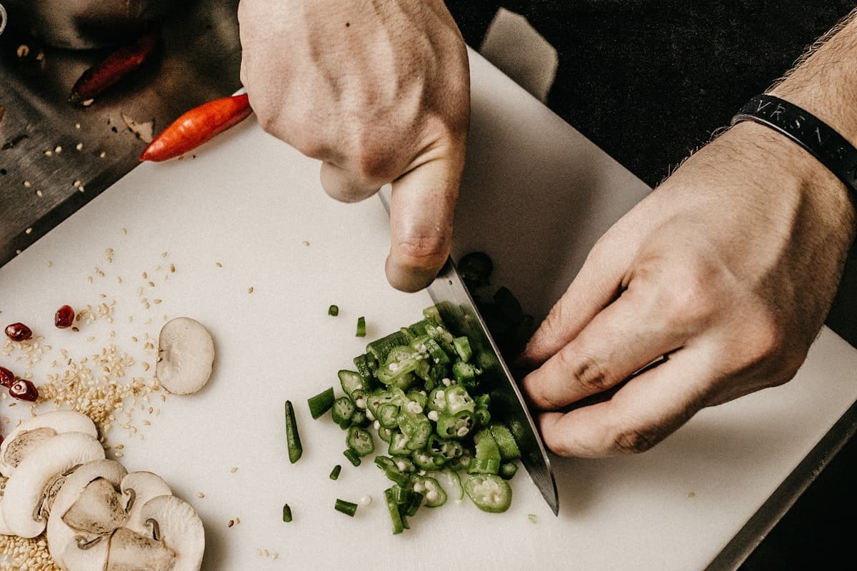 Illustrative chef preparing a tasting-menu dish